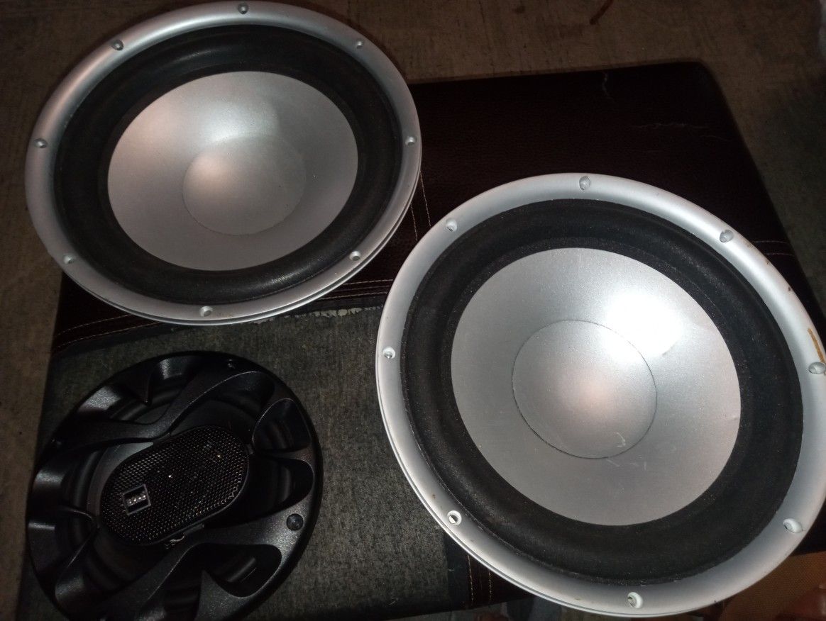 Two 10" Polk Audio Subwoofers + one 6.5" Boss Chaos Exxtreme Speaker
