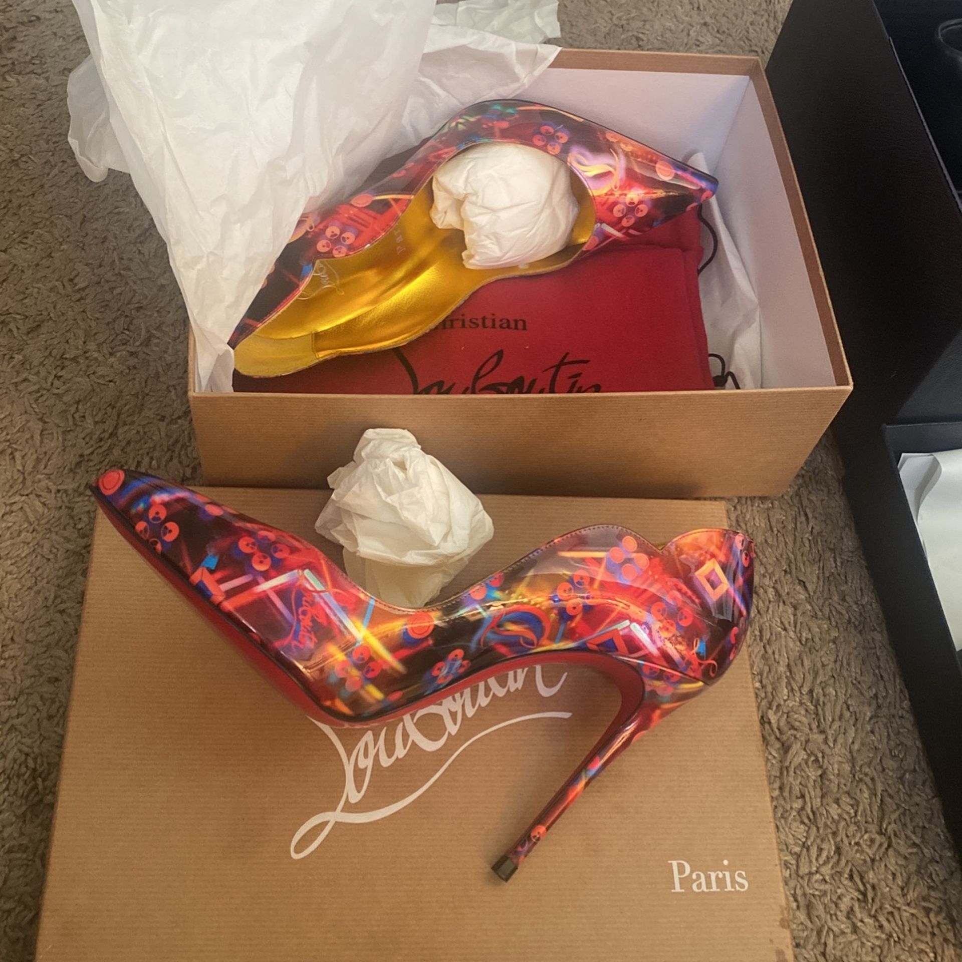 Christian Louboutin And Prada Shoe