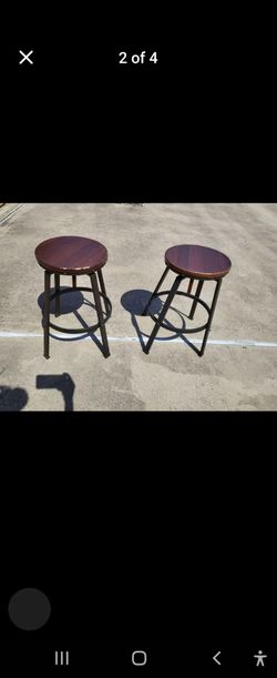2 adjustable barstools. Read the description below
