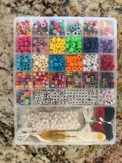 4 Boxes of beads for bracelet making