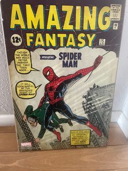 Marvel wall decor on wood 19.5 inches tall / 13 inches wide