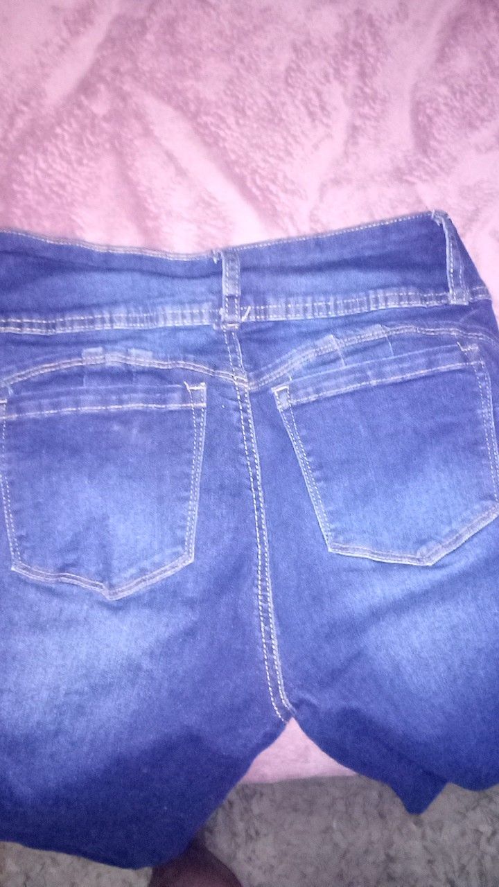 New never worn. Size 5 wax butt jeans