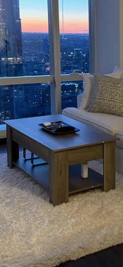 Lift-Top Coffee Table with Storage – Good Condition