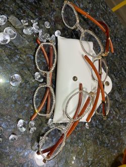 One (1) Millionaire Executive Unisex wooden frame with sparkling lab, diamond ice trim. Comes with a white protective case for secure storage. Comfort