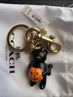 2024 Coach Pumpkin Cat Keychain – $85 