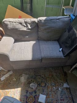 free couch and tv with wall mount