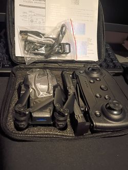 E88 Drone With 2 Batteries and carrying case