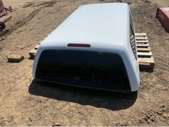 Snug top camper shell
