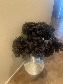Silver vase, black flowers very cool