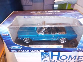 Welly 64 -1/2 Ford Mustang.