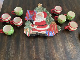 Set para Navideño 8 tazas y una charola, la use una sola vez.