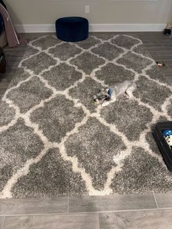 Plush 8x10 Carpet and Pottery Barn Table with 3 red armchairs