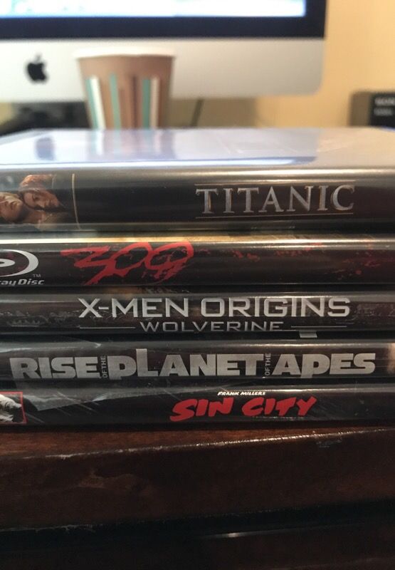 5 blue ray movies - titanic, 300, X men, Sin City and Planet of apes