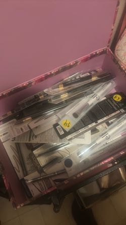 Eyebrow pencil and brushes