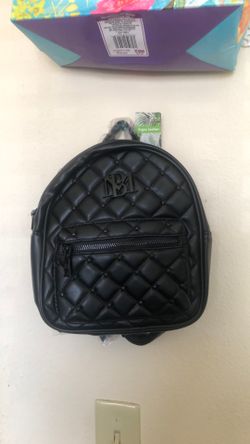 M B Vegan Leather baffle y Mischka