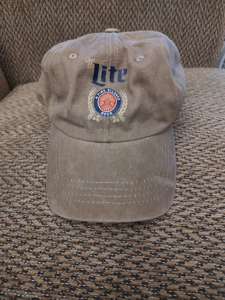 MILLER LITE BASEBALL CAP.  ADJUSTABLE STRAP.  NEW.  PICKUP ONLY.