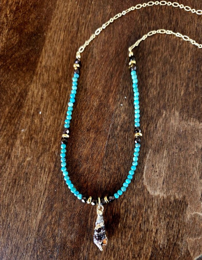 Turquoise Gold Banded Cinerea Shell Necklace