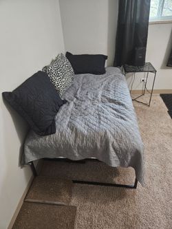Twin size bed with frame