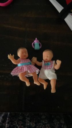 My mini baby doll toy TWINS!!!!!(comes with baby bottle)