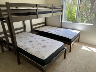 Triple bunk bed frame with mattresses
