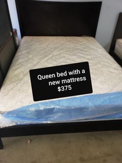 Queen bed with a mattress $375