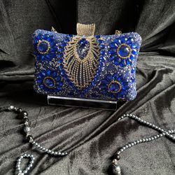 Luxurious Blue And Gold Peacock Clutch