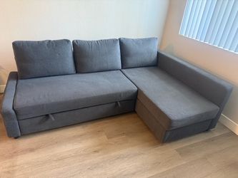 IKEA gray L shaped sleeper sofa