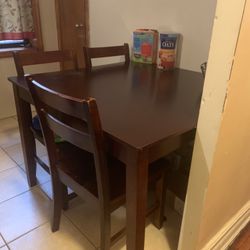 Very Lightly Used Kitchen Table Set Slight Scratch on one of the chair. Which can be fix easy  with a color pen. 