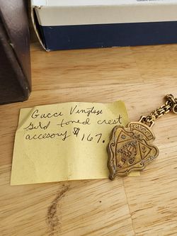 Gucci vintage perfume crest accessory
