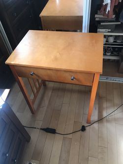 Wooden desk with drawer