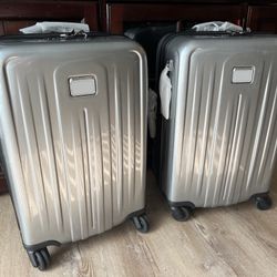 2 Brand New Tumi Carry-ons