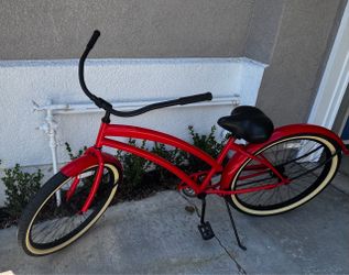 Red Beach Cruiser with New Tire Tubes Installed