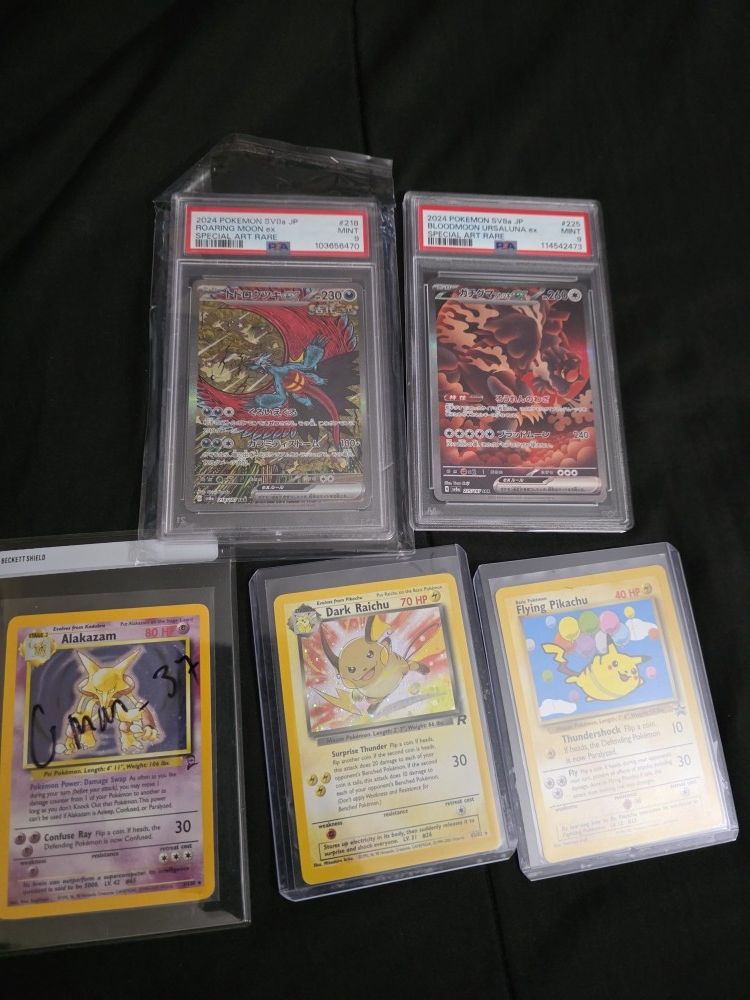 Pokemon Cards And PSA Slabs