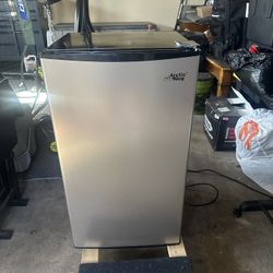 Artic king mini fridge with freezer.