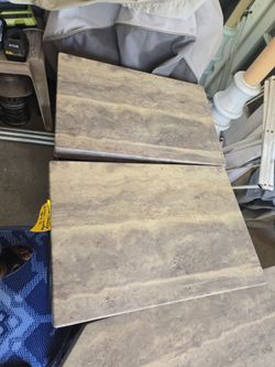 2 tables Can even put books on the sides
