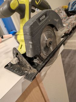 Ryobi ONE+ 18V 5-1/2" Cordless Circular Saw (Model P505) equipped with a Ryobi 4.0Ah Lithium-Ion Battery (Model P197).