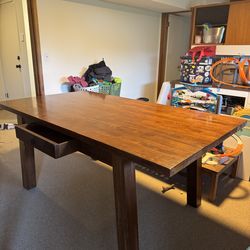 Solid teak dining table