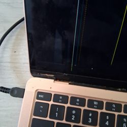 Rose gold MacBook And Asus Laptop