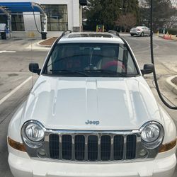 White Jeep Liberty 