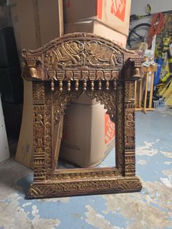 Wood carved frame