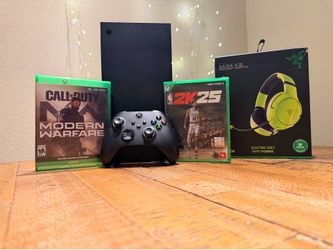 Excellent condition Xbox series x with 2 Games and brand new razer headset