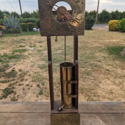 Antique Brass and Wood Water Clock with Sun Design - Unique Historical Collectible


