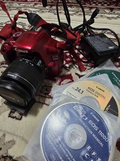 Canon EOS 1100d with lens and bag