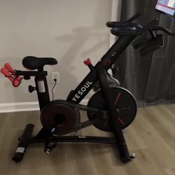 Workout bike with weights and large screen 