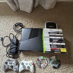 Black Xbox 360 + Controllers and Games 