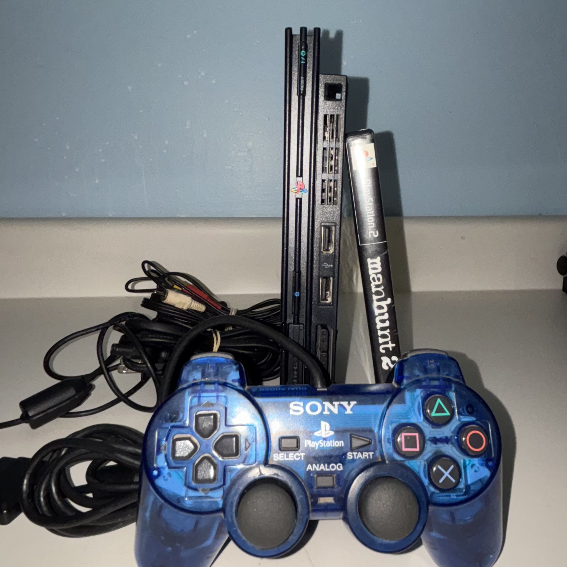 PS2 Slim + Rare Blue OEM Controller + Manhunt 2 (Complete) – Excellent Condition