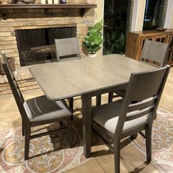 Dropleaf dining table with four chairs