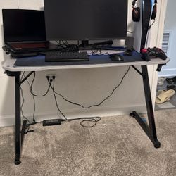 Red, Black, And Grey Gaming Table