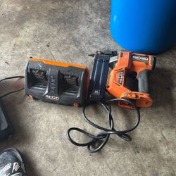 18V Brushless Cordless 18-Gauge 2-1/8 in. Brad Nailer with CLEAN DRIVE Technology with   Charger but no battery battery