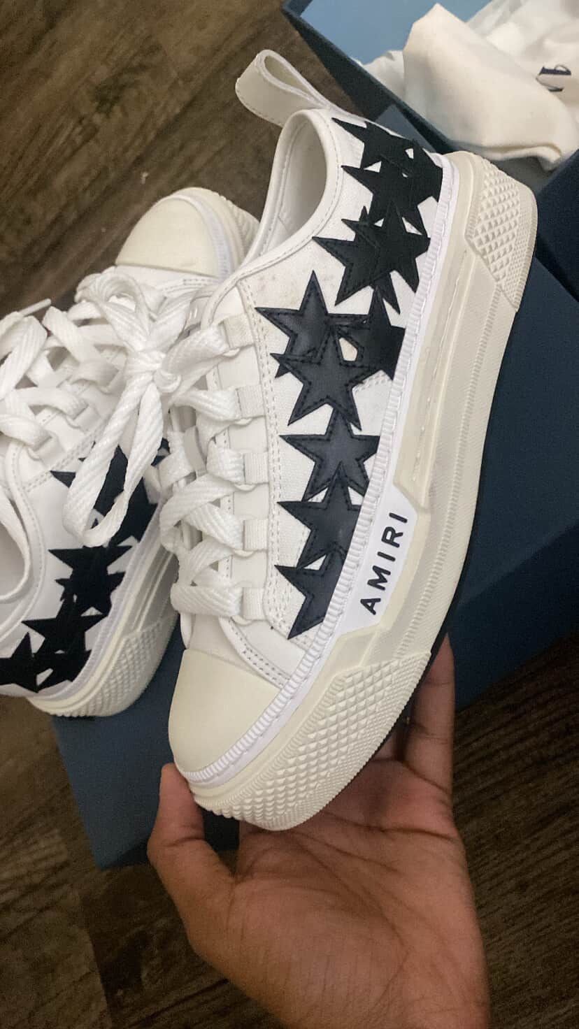 White and black Amiri trainers